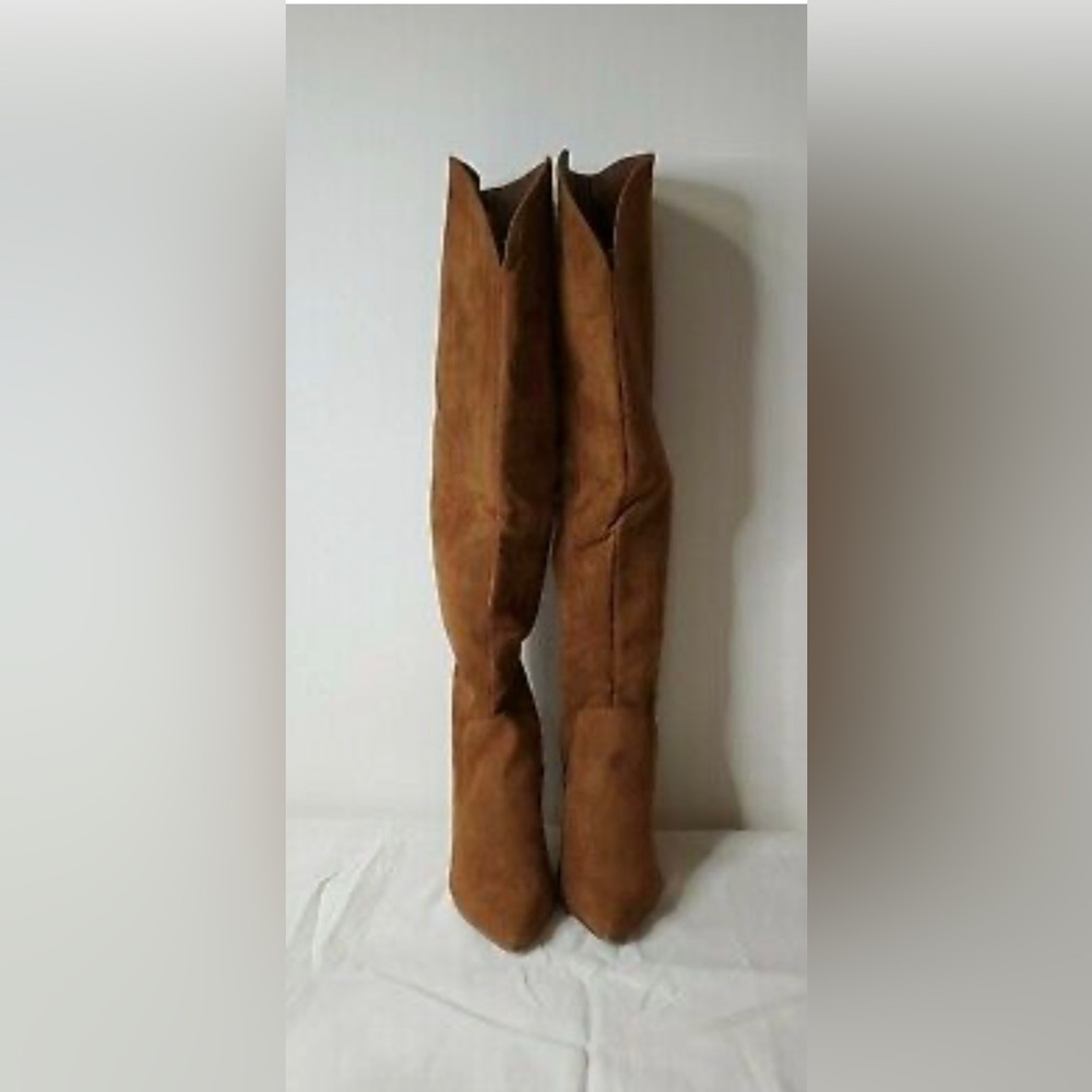 Heeled Clayton Camel boot . New , never worn .